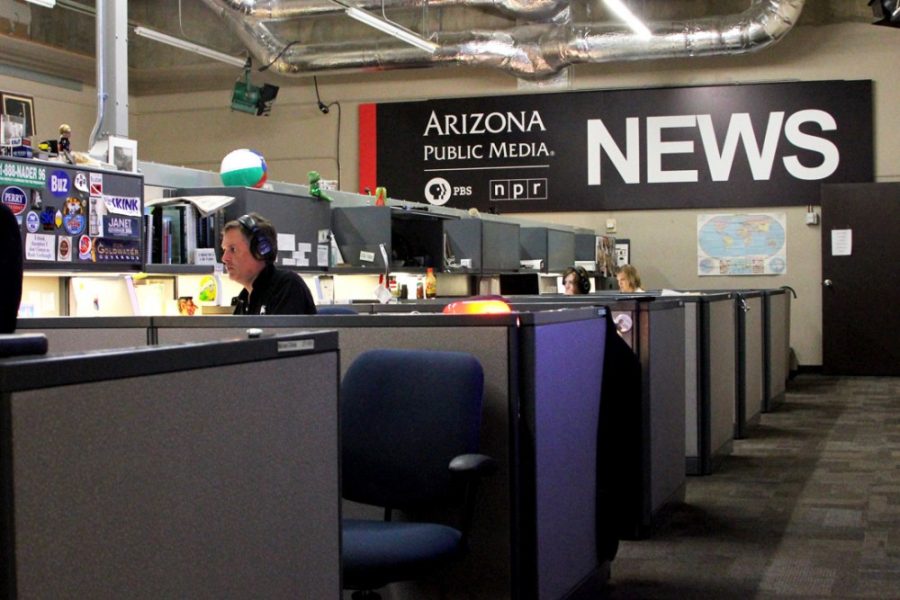 	Radio and television reporters work on stories in the Arizona Public Media newsroom on Tuesday. AZPM received budget cuts for the upcoming semester and will be losing $400,000 a year over the next five years.