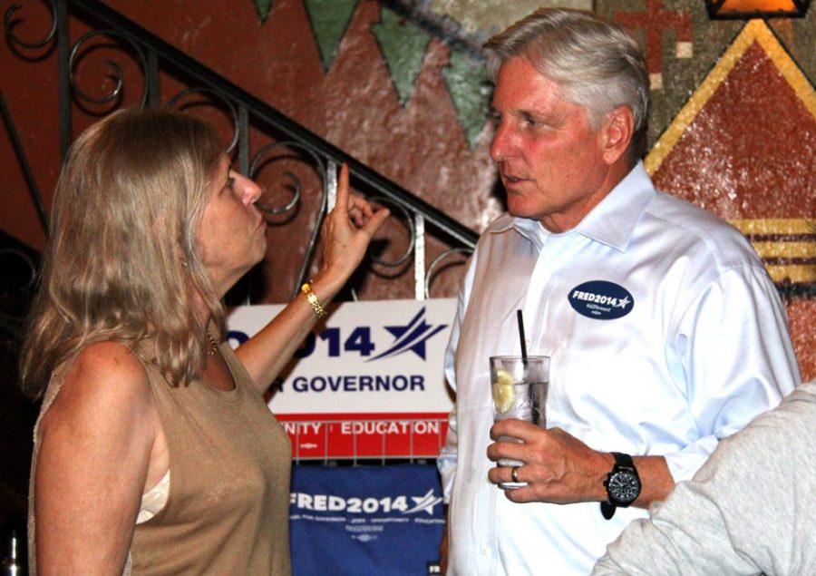 Cooper Temple / The Daily Wildcat

Fred Duvall, the democratic candidate for governor, speaks with Shana Oseran, the owner of Hotel Congress, at his rally in Tucson on Sept. 6, 2014. Duvall will be participating in a debate on Sept. 21 at the University of Arizona.