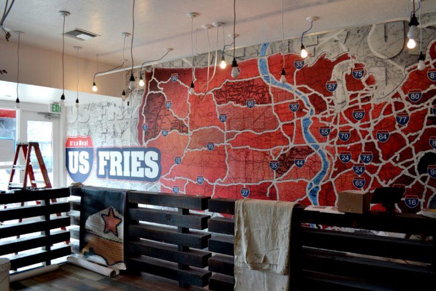 	Construction makes their finishing touches to US Fries’ amenities before its grand opening this Friday, Sept. 12th. The new eatery runs its business completely paperless to instill an eco-friendly mentality. 