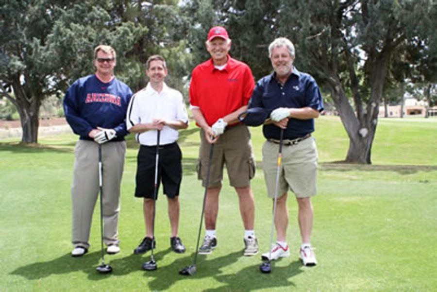 	Courtesy of Diana Himelic 

	Former UA basketball coach Lute Olson and other attendees at the Jim Himelic Memorial Golf Classic, hosted by the Jim Himelic Foundation. The foundation is working towards its $1 million goal of raising money for amyotrophic lateral sclerosis research. 