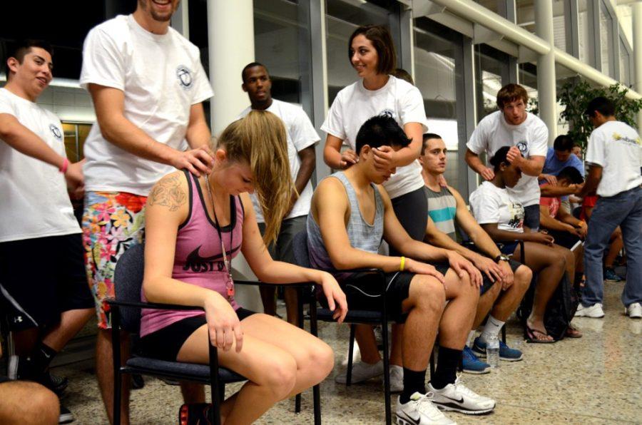 Grace Pierson / The Daily Wildcat

Students enjoy a free massage from the Stressbusters at the Rec Center on Oct. 10, 2013.