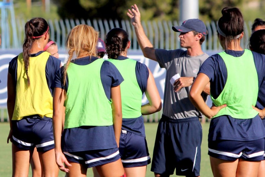 Arizona soccer head coach Tony Amato splits the team up into groups during practice at Murphey Field at Mulcahy Soccer Stadium on Sept. 2. Amato and the Wildcats travel to the Washington schools this weekend as they look to add to an already strong season.