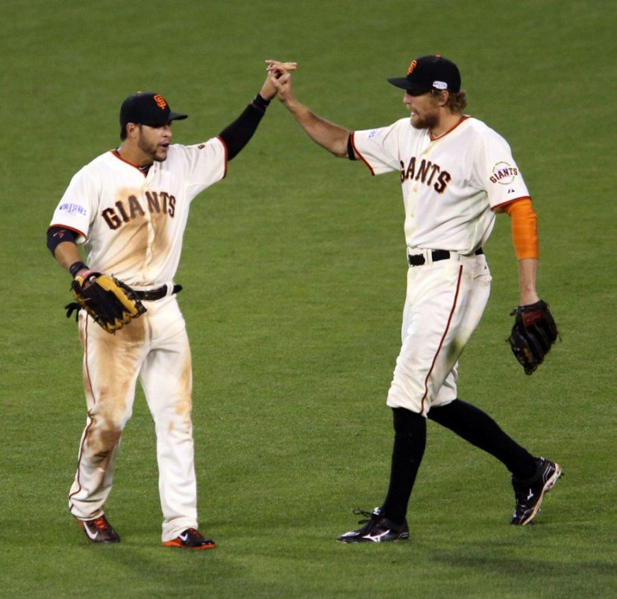San+Francisco+Giants+outfielders+Gregor+Blanco%2C+left%2C+and+Hunter+Pence+celebrate+an+11-4+win+against+the+Kansas+City+Royals+in+Game+4+of+the+World+Series+at+AT%26amp%3BT+Park+in+San+Francisco%2C+on+Friday%2C+Oct.+25%2C+2014.+The+series+is+tied%2C+2-2.+%28Anda+Chu%2FBay+Area+News+Group%2FMCT%29
