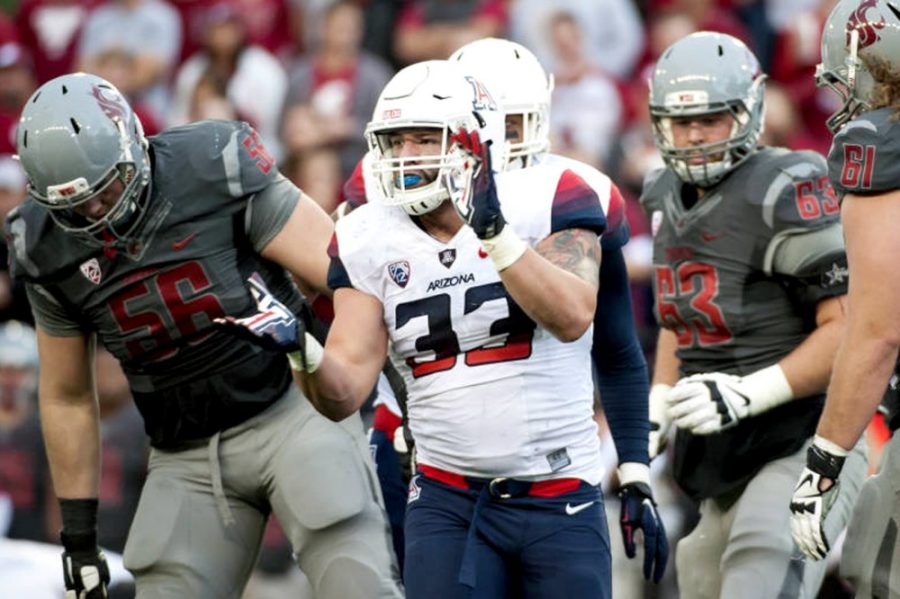 Courtesy+of+Arizona+AthleticsArizona+football+sophomore+defensive+lineman+Scooby+Wright+III+%2833%29+celebrates+during+Arizonas+59-37+win+against+Washington+State+at+Pullman%2C+Wash.%2C+on+Saturday.+Wright+III+was+named+Pac-12+Defensive+Player+of+the+Week+following+his+eight-tackle%2C+three-sack+performance+against+the+Cougars+this+past+weekend.