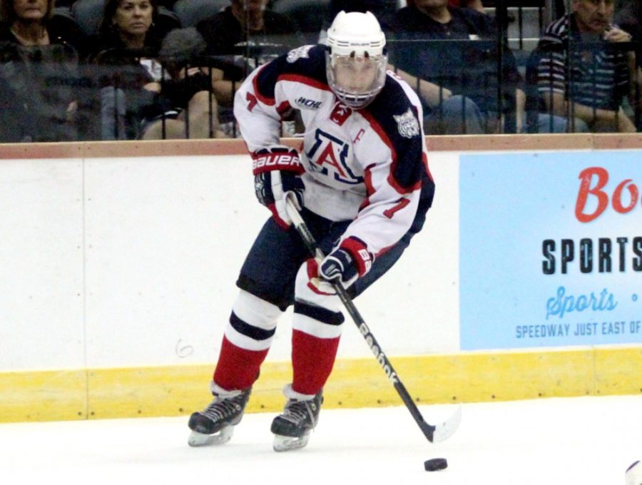Arizona hockey sophomore forward Alex ODea (7) looks for an open player during Arizonas 4-3 loss against Liberty at the Tucson Convention Center on Saturday. ODea and the Wildcats suffered back-to-back 4-3 losses against Liberty this weekend.