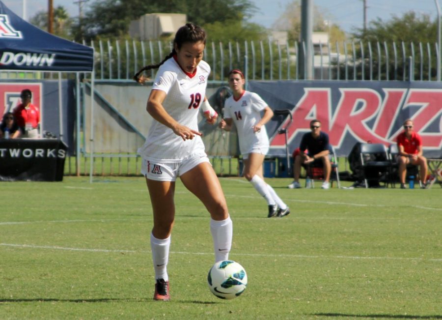 Arizona senior midfielder Julia Glanz (19) dribbles the ball down the field during Arizonas 1-1 tie against California on Sunday. Glanz and the Wildcats will take on Utah and Colorado over the weekend as they look forward to postseason play.