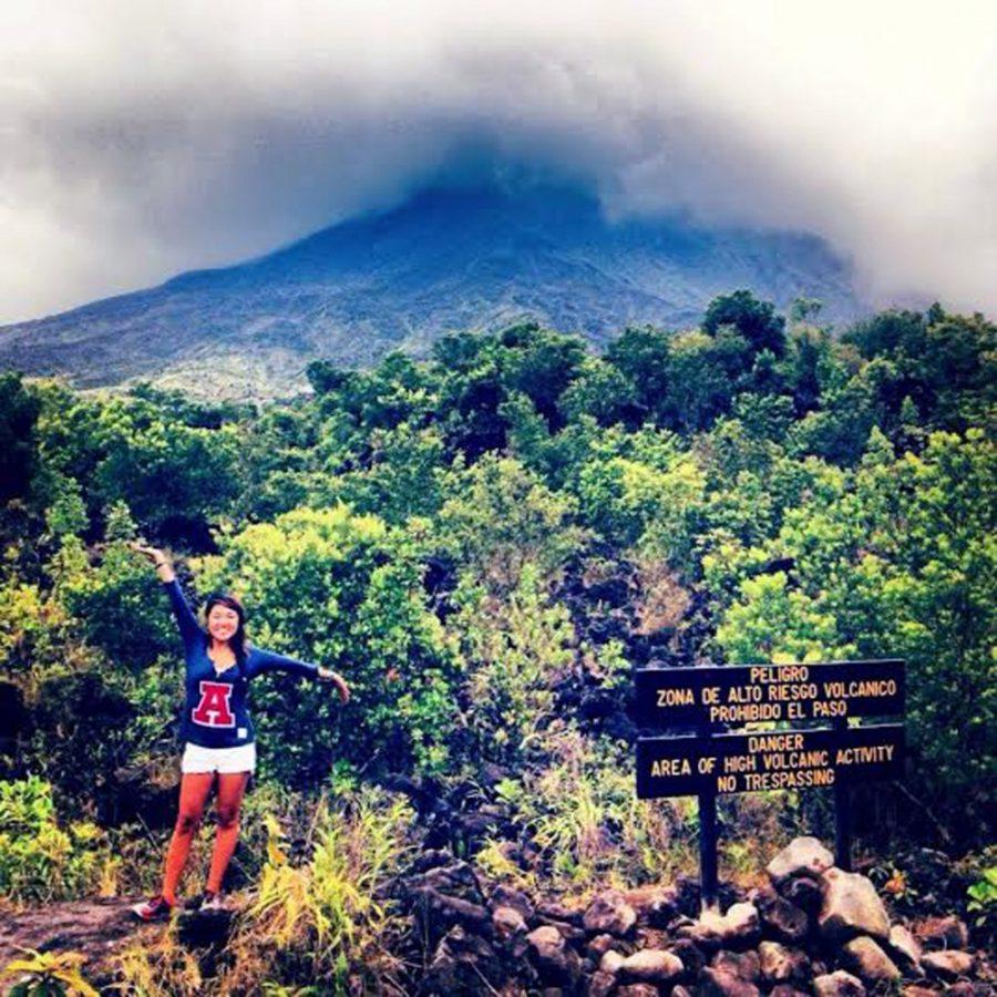 Courtesy of Meg MoritaPublic health senior Meg Morita stands in  front of Arenal Volcano during a study abroad trip to Costa Rica. 2015  is expected to see an increase in study abroad students, and the UA is  adding 19 new programs.
