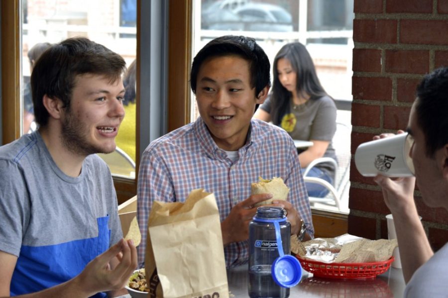 John Sullivan, a pre-physiology freshman, and Aaron Kwan, a mechanical engineering freshman, enjoy a burrito at Chipotle Mexican Grill located on University Blvd. near Main Gate. On Jan. 26 Chipotle will have a promotion where customers can purchase Sofritas and bring back their receipt to claim a free burrito, bowl, salad, or order of tacos.