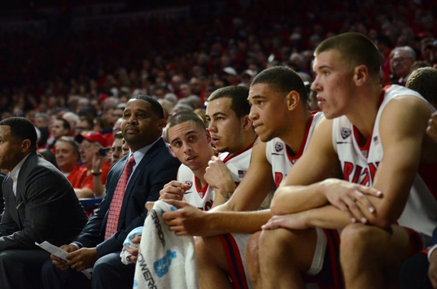 Arizona mens basketball assistant  coach Damon Stoudamire, guard T.J. McConnell, guard Gabe York, forward  Brandon Ashley and center Kaleb Tarczewski, left to right, sit on the  bench during Arizonas 73-49 win against ASU in McKale Center on Jan. 4.  The Wildcats have been suplanted for the No. 1 spot in our weekly  Pac-12 power rankings by the Utah Utes.