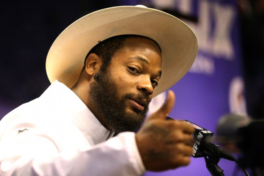 Seattle Seahawks defensive lineman Michael Bennett gives a thumbs-up during Media Day on Tuesday, Jan. 27, 2015, at the US Airways Center in Phoenix. (Bettina Hansen/Seattle Times/TNS)