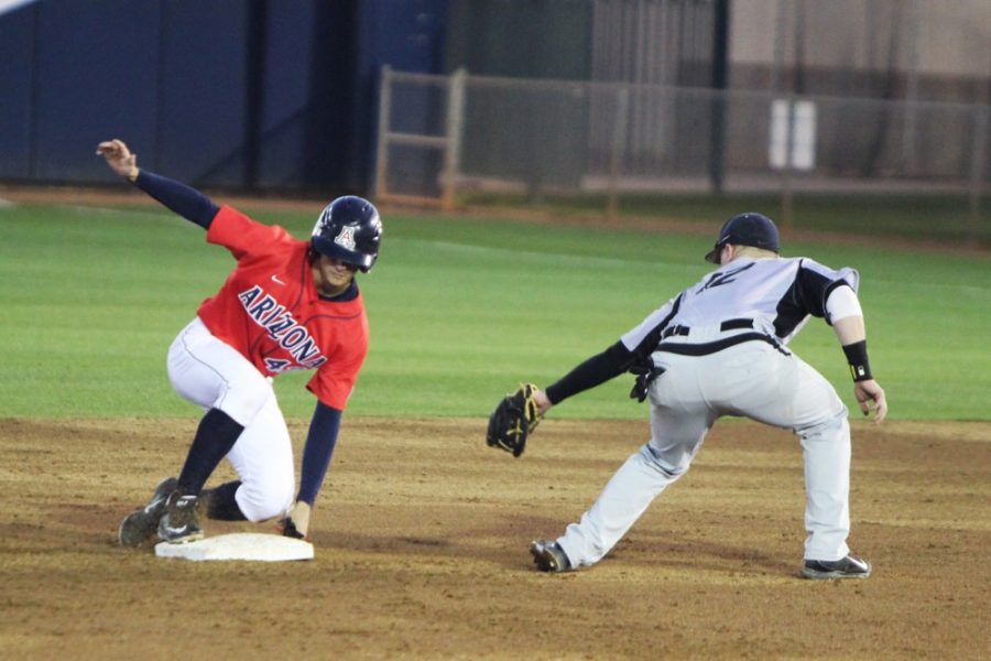 Arizona baseball outfielder Jared Oliva safely slides into second base during Arizonas win against Oakland. Oliva and the Wildcats took down Oakland 10-7 at Hi Corbett Field on Tuesday.