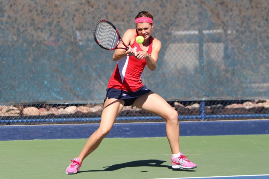 Arizona+womens+tennis+player+Briar+Preston+swings+during+her+and+Shayne+Austins+doubles+match+7-3+win+against+Brigham+Youngs+Mayci+Jones+and+Toby+Miclat+on+Friday.+Preston%2C+Austin+and+the+Wildcats+defeated+BYU+4-3+over+the+weekend.