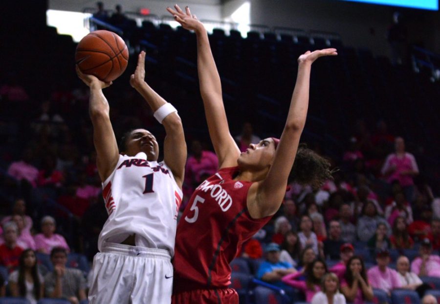 Arizona womens basketball guard Candice Warthen (1) shoots over Stanford forward Kaylee Johnsons (5) reach during Arizonas 60-57 win against Stanford in McKale Center on Feb. 8. Warthen and the Wildcats take on Oregon and Oregon State this weekend.