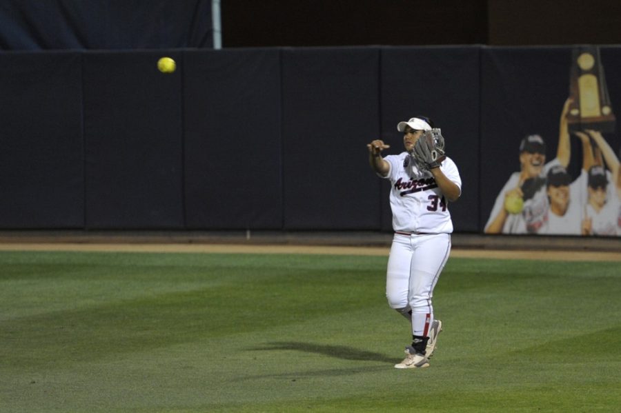 Arizona softball outfielder Katiyana Mauga (34) throws the ball back to the pitcher during Arizonas 13-7 win against New Mexico State at Hillenbrand Stadium on April 23, 2014. Mauga and the Wildcats take on Oklahoma State for a season-opening, three-game series this weekend. 