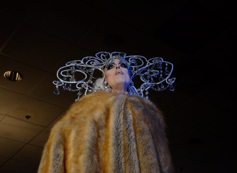 Patrick Holt as Tempest DuJour performs a dance routine to Let It Go  during #Turnabout for TIHAN Drag Ball at the DoubleTree by Hilton hotels  on Aug. 31. Holt is a professor at the UA in the School of Theatre,  Film and Television, as well as an active drag queen.