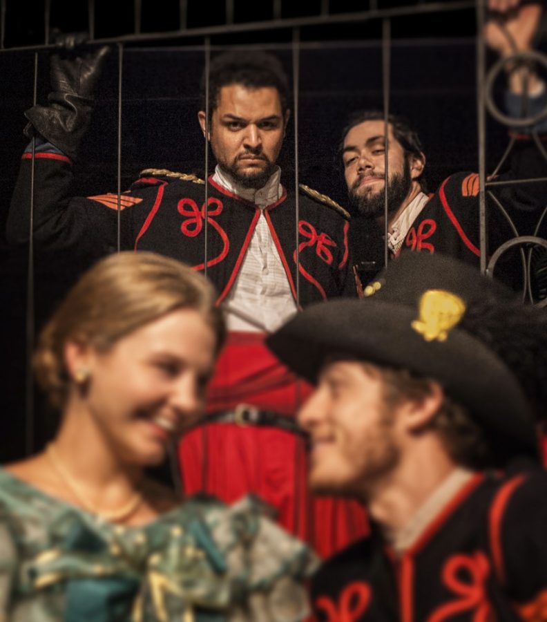 Courtesy of Ed Flores / Arizona Repertory TheatreIago (Matt Bowdren, top right) plots against Othello (Chris Okawa) and his love as he plants the idea that Desdemona (Kierna Conner) is having an affair with Cassio (Ethan Kirschbaum) in William Shakespeare’s Othello. The play runs until Sunday at the Tornabene Theatre.