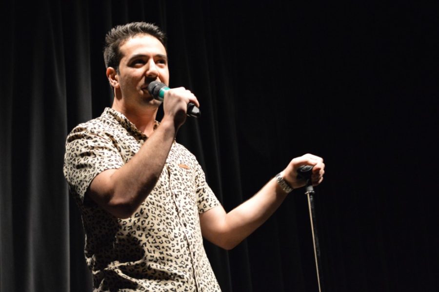Communication senior Mike Mazzella performs standup comedy in Gallagher Theater in the Last Comic Standing competition on Tuesday night. This was Mazzellas first standup performance, but he has been doing improv since high school.