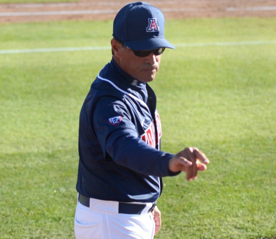 Arizona baseball coach Andy Lopez walks back into the dugout during Arizonas 10-7 win against Oakland at Hi Corbett Field on Feb. 24. Lopez and the Wildcats have turned around the team attitude, and record, this season.