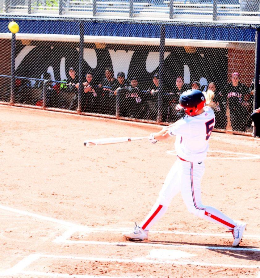 Arizona softball utility player Hallie Wilson (5) hits a home run during Arizonas 8-3 victory over UNLV on March 4 at Hillenbrand Stadium. Wilson and the Wildcats have struggled against top-level talent this season, inciting talk that Arizona needs to improve.