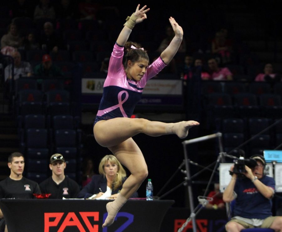 Arizona gymnast Allie Flores performs her floor routine during Arizonas 196.425-196.100 win against California in McKale Center on Feb. 28. The Wildcats end their home portion of the schedule with Senior Night against Denver on Saturday.