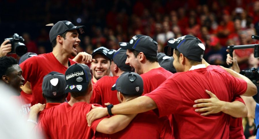 The Arizona mens basketball team rejoices after winning the Pac-12 championship and beating Stanford 91-69 in McKale Center on Saturday. While Arizona does not need to win the Pac-12 tournament to make the NCAA tournament, several teams from the middle to bottom of the conference need successful weekends to get in.