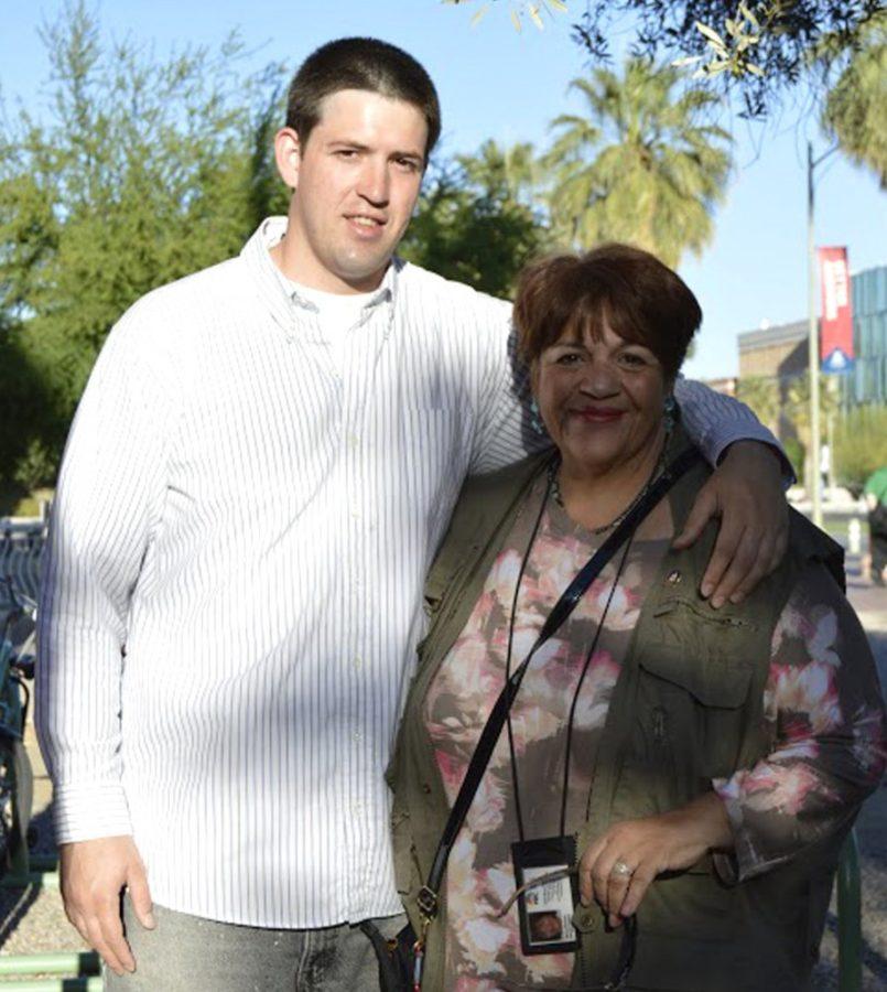 Hal Montoya-Iljams and Nancy Montoya-Iljams pose for a photo outside of the Modern Languages building on Wednesday, two days before the rally for education they plan to participate in on campus. The mother and son have been working to spread the word about the rally to support public education funding in Arizona.