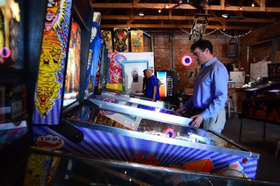 Matt+Tropman+plays+pinball+at+D%26amp%3BD+Pinball+on+Fourth+Avenue+and+Seventh+Street+on+Thursday.+Tropman+comes+to+play+once+every+week+or+two+and+said+that+its+nice+that+this+place+is+here.