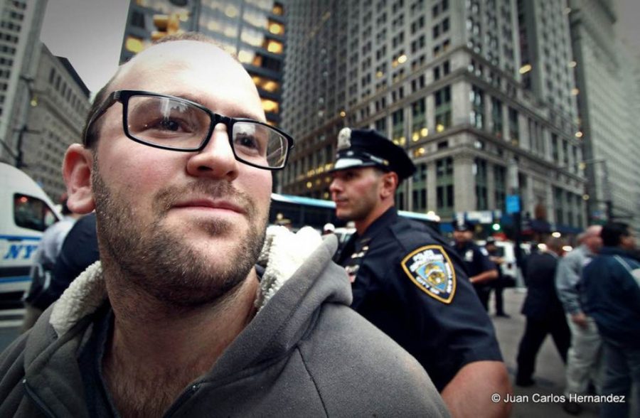 Courtesy of Juan Carlos HernandezJustin Wedes gets arrested at Occupy Wall Street in September 2011 while speaking on a megaphone in Zuccotti Park. Wedes will speak at the Social Movements in the Digital Era seminar discussing social medias role in social movements.