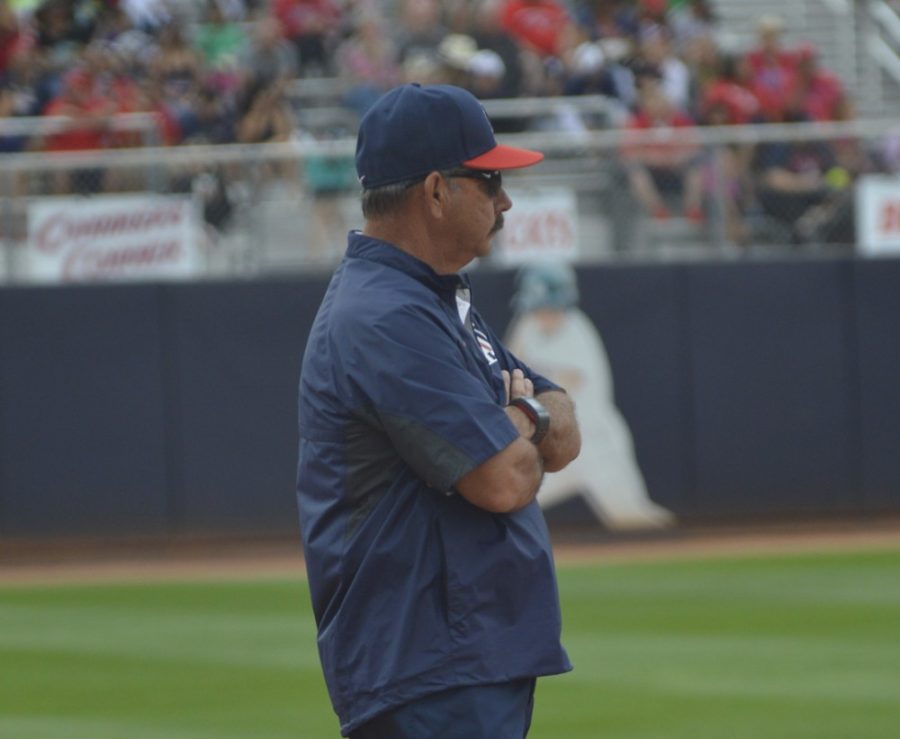 Arizona+softball+coach+Mike+Candrea+looks+on+during+Arizonas+18-10+victory+over+Washington+on+April+12+at+Hillenbrand+Stadium.+While+Arizonas+offense+has+been+dominant%2C+its+pitching+staff+has+underperformed%3B+something+Candrea+has+spoken+about+all+season+long.
