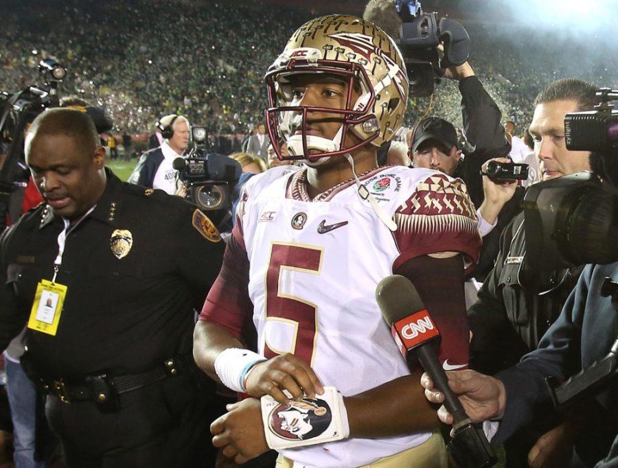 FSU quarterback Jameis Winston walks off the field, dejected after losing the Rose Bowl College Football Semifinal game to Oregon on Thursday, Jan. 1, 2015 in Pasadena, Calif. Oregon won 59-20. (Stephen M. Dowell/Orlando Sentinel/TNS) 