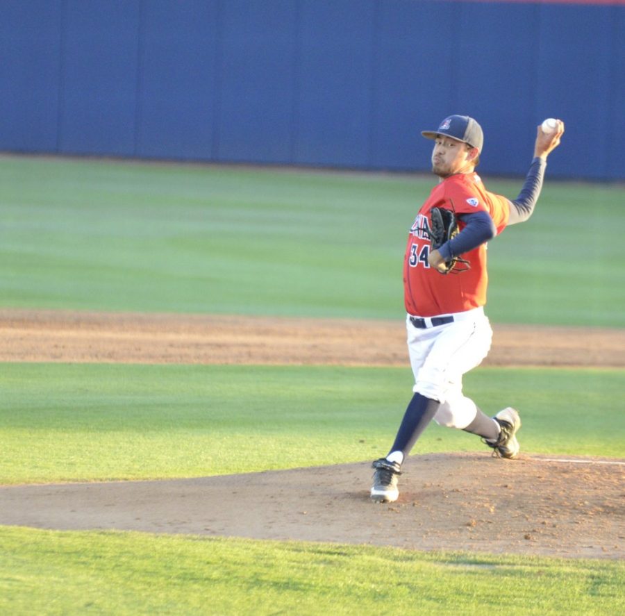 Arizona baseball pitcher Robby Medel (34) pitches during Arizonas 17-6 win against ASU on Tuesday night at Hi Corbett Field. Along with J. J. Matijevic, Medel has provided an early impact in his first season at Arizona.