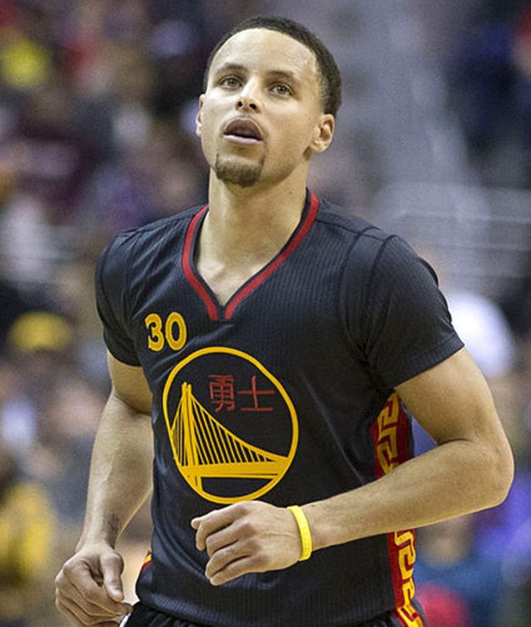 Courtesy of Keith AllisonGolden State Warriors guard Stephen Curry (30) runs down the court during Golden States 114-107 victory over the Washington Wizards in the Verizon Center in Washington, D.C., on Feb. 24, 2015. Curry was named the 2014-15 NBA MVP on Monday.