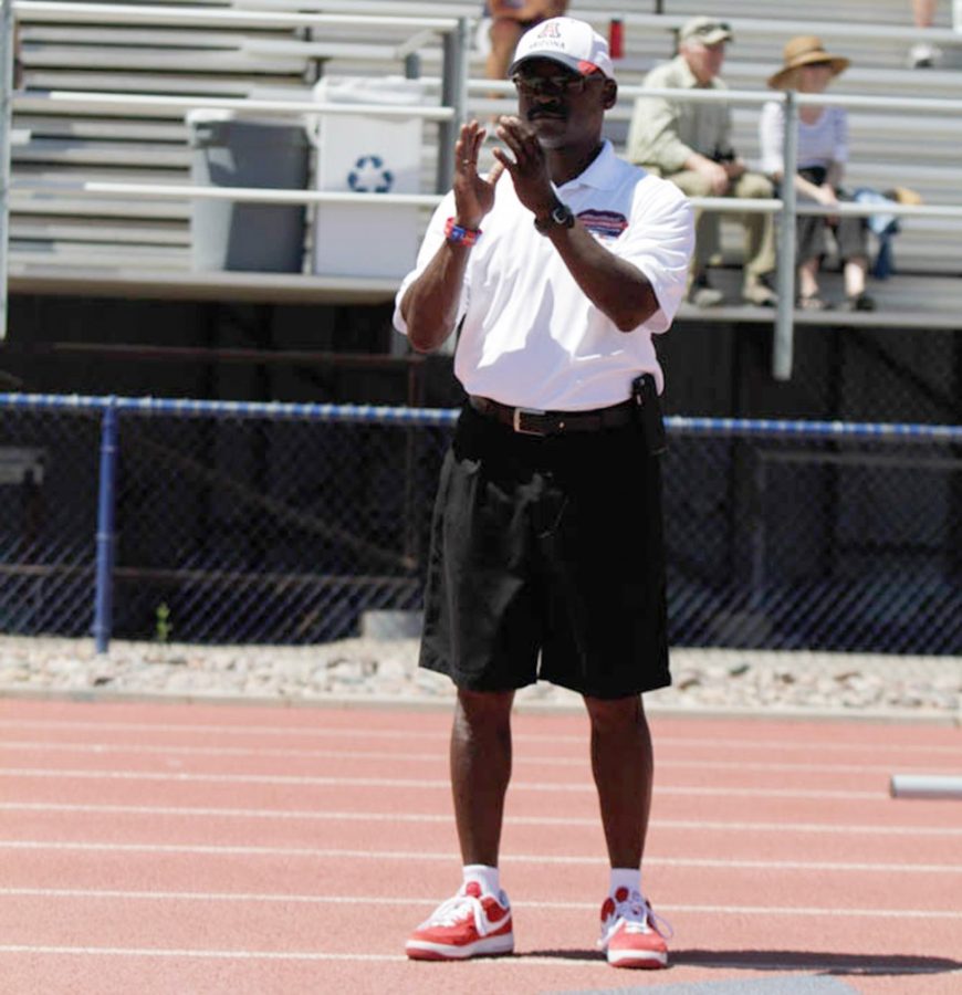 Arizona track and field coach Fred Harvey claps during Arizonas third-place finish in the Jim Click Shootout at Roy P. Drachman Stadium on April 11. Harvey and the Wildcats head to Tempe for a Duel in the Desert matchup with ASU.