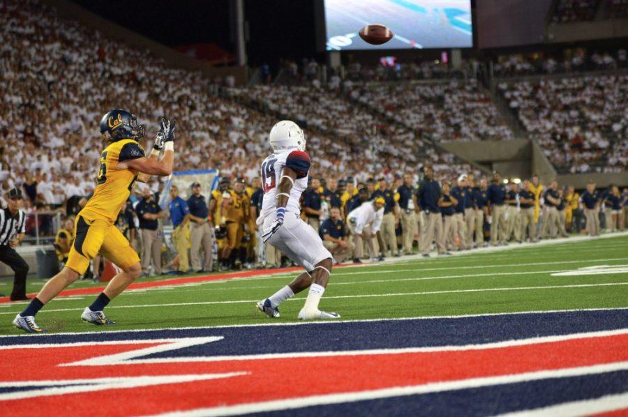 Arizona+cornerback+DaVonte+Neal+tries+for+a+block+during+a+game+against+Cal+on+Saturday%2C+September+20%2C+2014.+The+Wildcats+beat+Cal+with+a+final+score+of+49-45.+