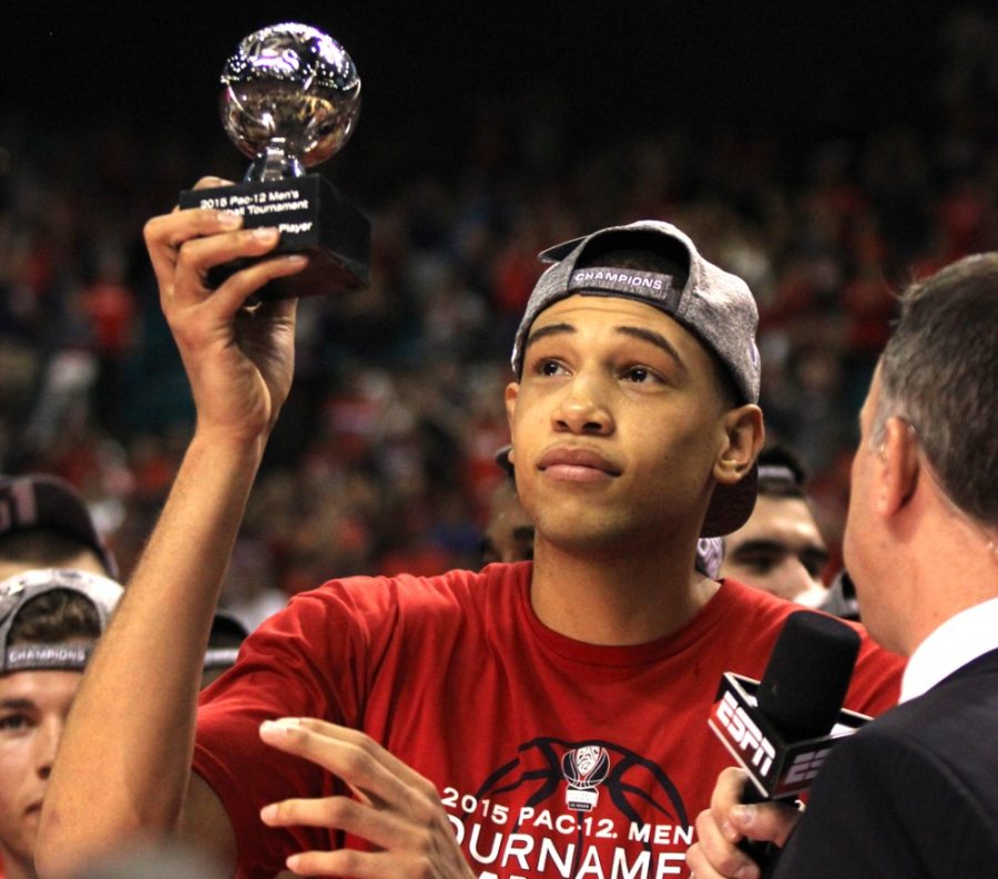 File Photo/Arizona Summer WildcatThen-Arizona forward Brandon Ashley (21) holds up his trophy to the crowd after recieving the Pac-12 Tournament Most Outstanding Player after Arizonas 80-52 win over Oregon in the MGM Grand Garden Arena in Las Vegas, Nev. on March 14.