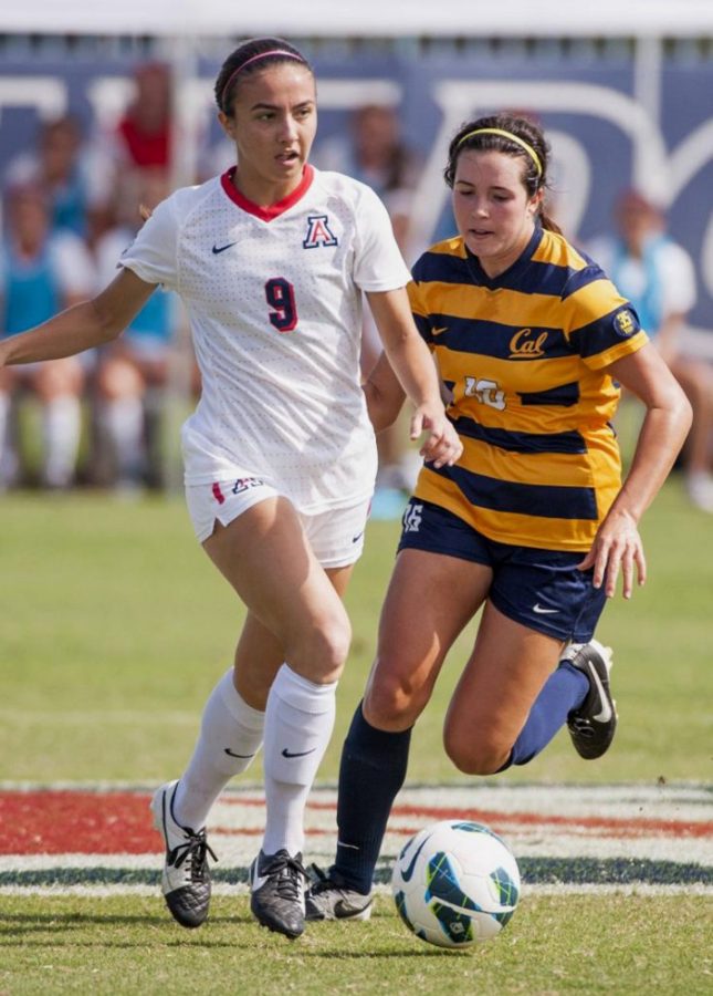 Arizona soccer player Gabi Stoian dribbles during a game versus California on Sunday, October 26, 2014. The game ended in a 1-1 tie.