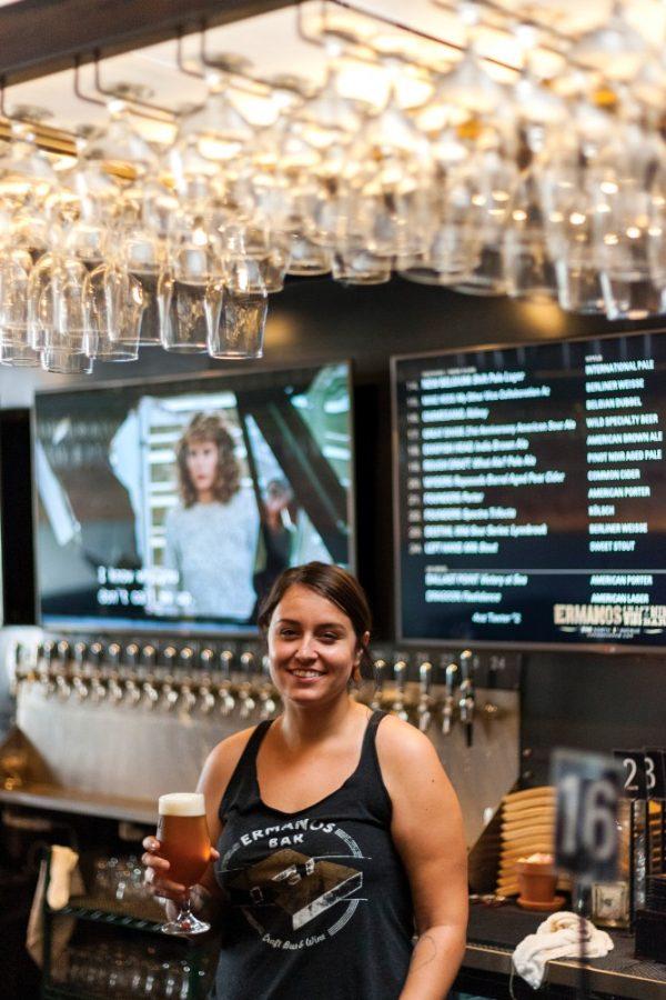 Felicia Uribe, a bartender at Ermanos Craft Beer & Wine Bar, poses for a photo on Wednesday, Sept 9. Ermanos is located on 220 N 4th Ave.