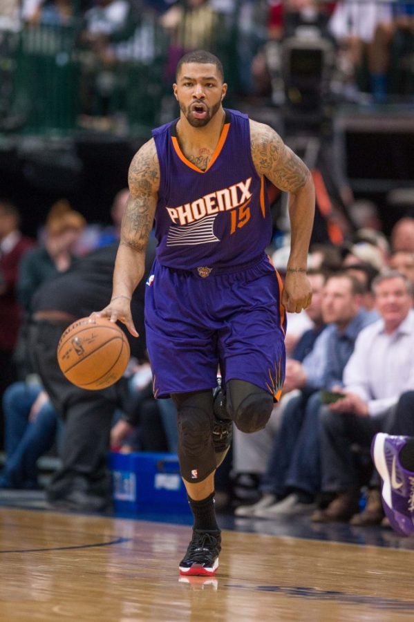 Apr 8, 2015; Dallas, TX, USA; Phoenix Suns forward Marcus Morris (15) brings the ball up court during the game against the Dallas Mavericks at the American Airlines Center. The Mavericks defeated the Suns 107-104. Mandatory Credit: Jerome Miron-USA TODAY Sports