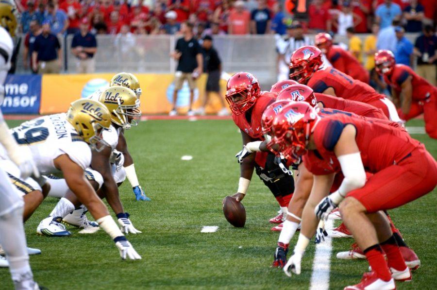 The Wildcats offense lines up for a play against UCLA on Saturday, Sept. 26. Arizona lost to UCLA 56-30.