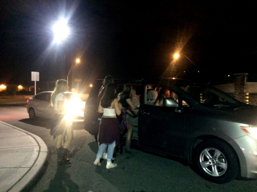 A group of girls pile into an Uber XL to leave a party at The Retreat at Tucson on Tuesday, Oct. 6.