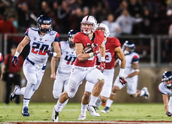 Courtesy of Sam Girvin/The Stanford DailyArizona safety Jarek Hilgers (20) chases Stanford down the field during the Wildcats loss on Saturday, Oct. 3. Arizona head coach Rich Rodriguez and the Wildcats are out of excuses moving forward in the rest of the season. 