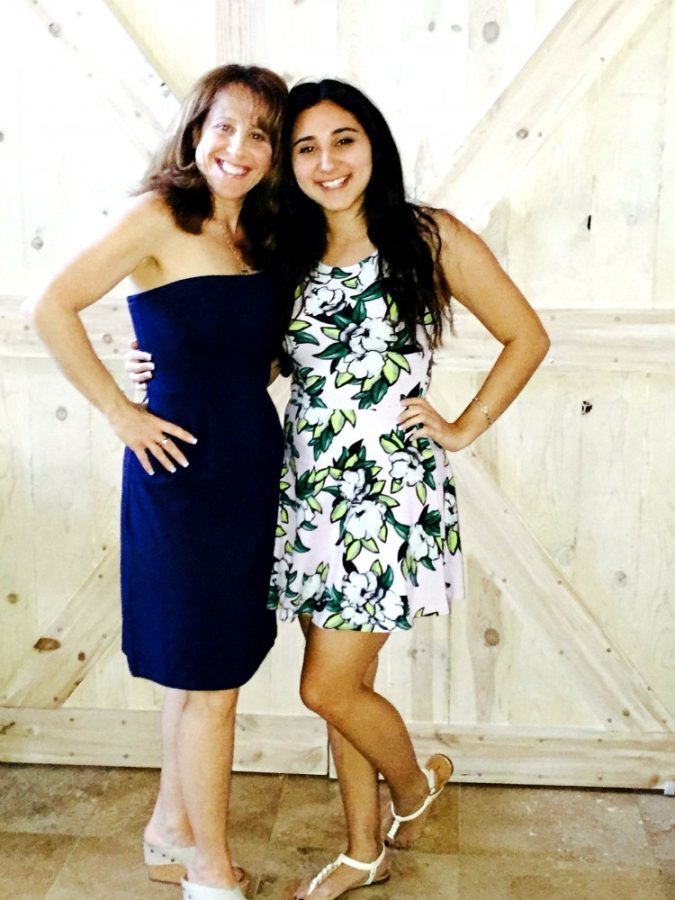 Courtesy of Marissa GiuntaUA alumnae Michelle Storcz, left, and Marissa Giunta, right, pose for a photo at Giuntas home on May 23. This Family Weekend, alumni are able to celebrate their Wildcat spirit with their UA students.