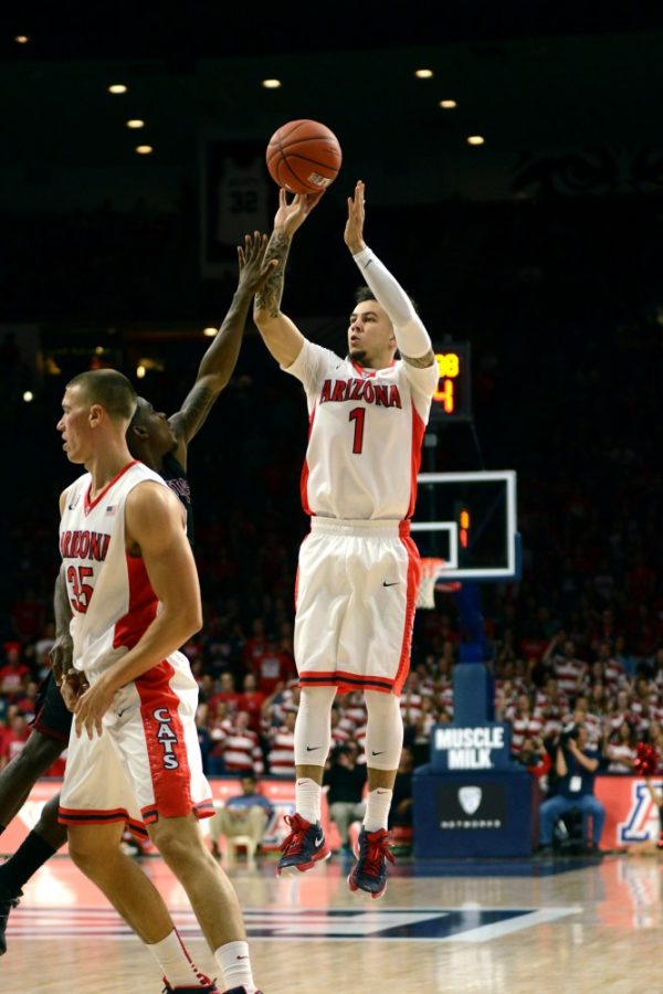Arizona guard Gabe York (1) attempts a fadeaway jumper in McKale Center during Arizonas exhibition against Chico State on Nov. 8. York hit two 3-pointers in the Wildcats 90-60 victory over Bradley on Nov. 16.