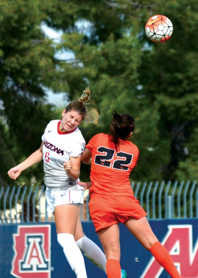 <p>Arizona defender Sheaffer Skadsen (6) nails a header ahead of Oregon State forward Mariah Roggow (22) on Murphey Field at Mulcahy Soccer Stadium on Oct. 25. Skadsen logged the second most minutes played on the team in 2014 and has been a leader on the Wildcats' shut down defense.</p>
