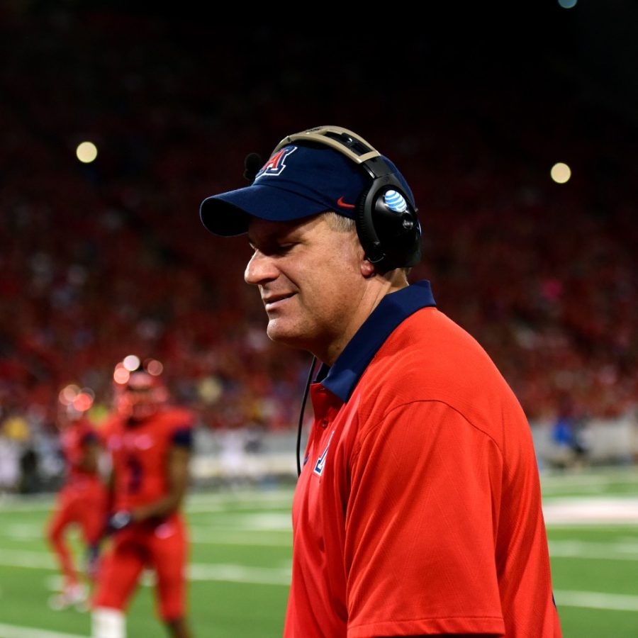 Arizona head coach Rich Rodriguez chuckles on the sideline of Arizona Stadium on Saturday, Sept. 26. Rodriguez will lead the Wildcats into their fourth straight bowl appearance.