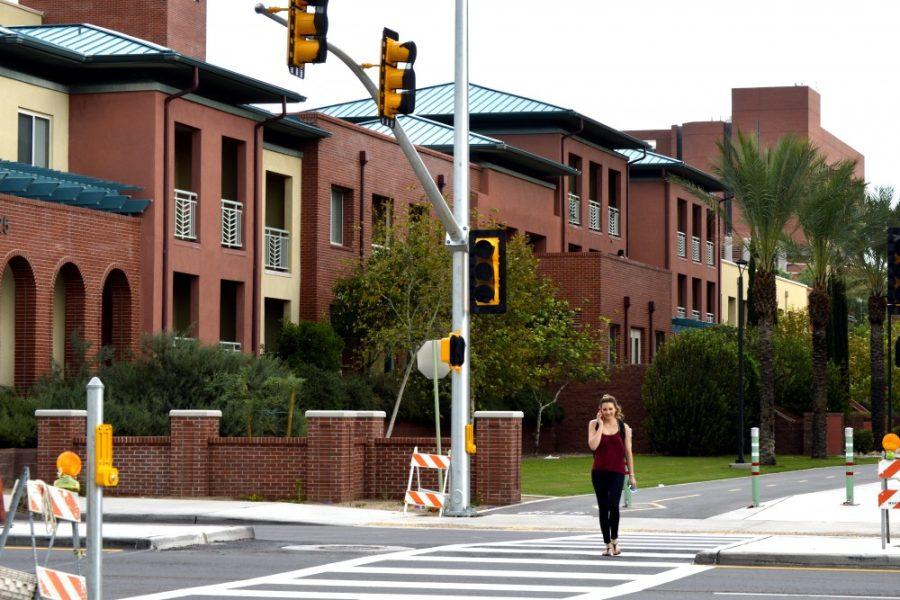 Cars drive through a crosswalk on Euclid Avenue just south of Sixth Street on Thursday, Sept. 3. The hit-and-run collision Saturday, Sept. 5, in which four UA students were struck, was close to the new lighted crosswalk.