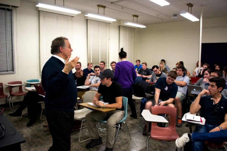 Associate professor of political sciences Pat Willerton discusses the use of obscenity in foreign languages with his Russian politics class in room 411 of the Social Sciences building on Tuesday, Jan. 19.