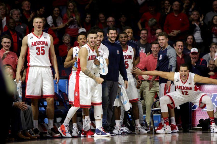 Arizona+guard+Gabe+York+%281%29+and+forwards+Mark+Tollefsen+%2823%29+and+Ryan+Anderson+%2812%29+celebrate+in+McKale+Center+on+Thursday%2C+Jan.+14.+Arizona+defeated+Washington+99-67+behind+Andersons+21+points+and+nine+rebounds.