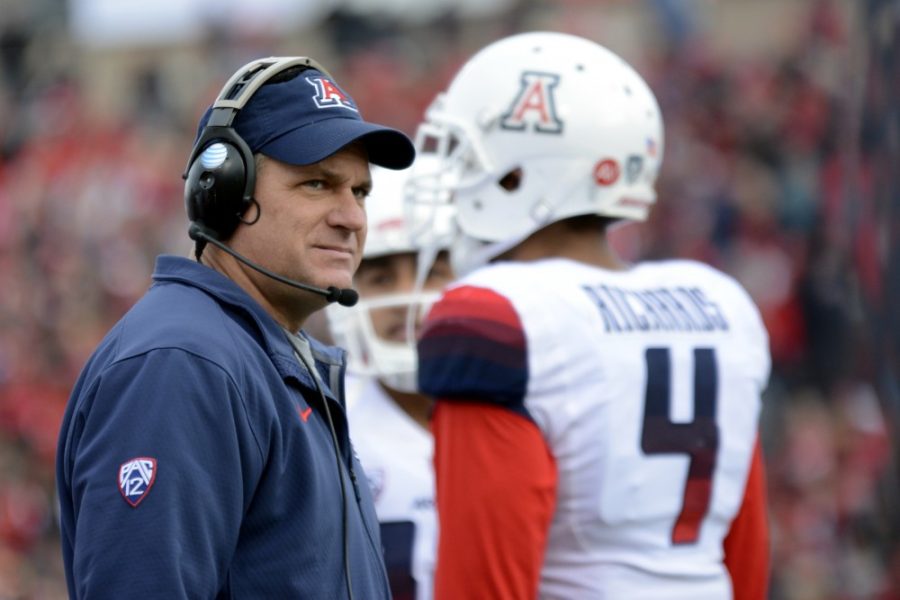 Arizona+football+head+coach+Rich+Rodriguez+stands+in+University+Stadium+in+Albuquerque%2C+New+Mexico%2C+on+Dec.+19%2C+2015.+The+Wildcats+await+National+Signing+Day+on+Wednesday%2C+where+recruits+across+the+country+send+in+their+letters+of+intent.+