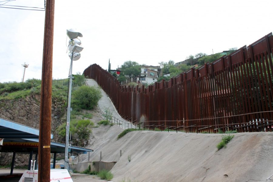 The Mexico-U.S. border fence on the east side of the Deconcini Port of Entry on Sunday, Aug. 9, 2015. The UA College of Social and Behavioral Sciences is working on a plan to create a border studies and outreach center in Nogales, Arizona. 
